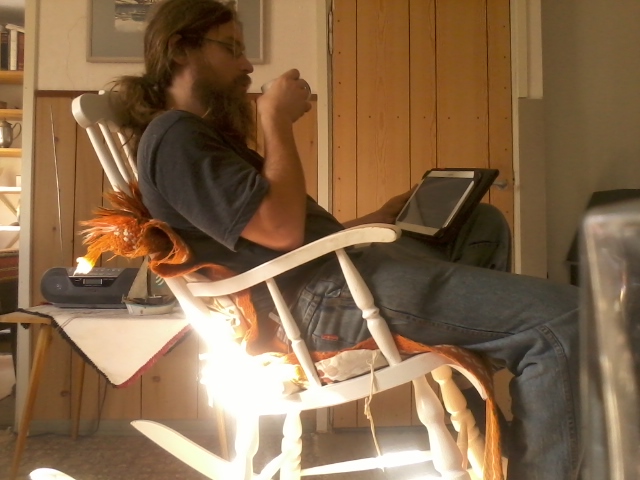 coffee break, reading "NPCs" by Drew Hayes